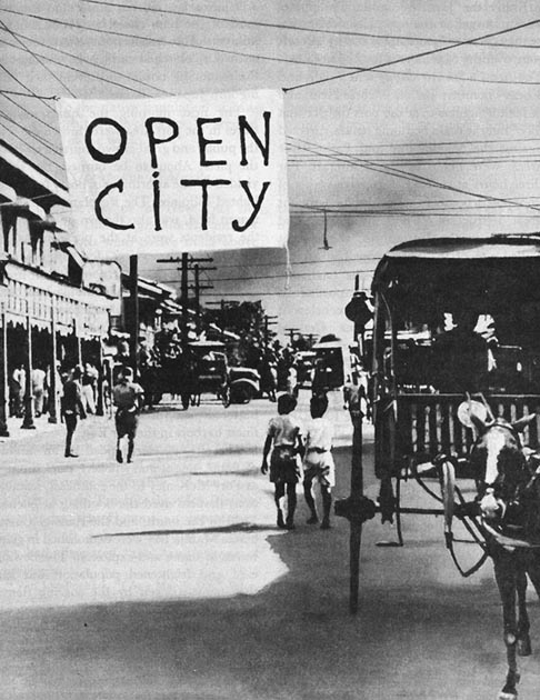 In war, an “open city” is a settlement its occupier declared not to defend, allowing the other side to march in and take the place without fighting and destruction. Such declarations are usually, but not always, respected. Which of these cities was an exception in World War II, where the attacker bombed the city anyway? (Photo does not depict the correct answer.)